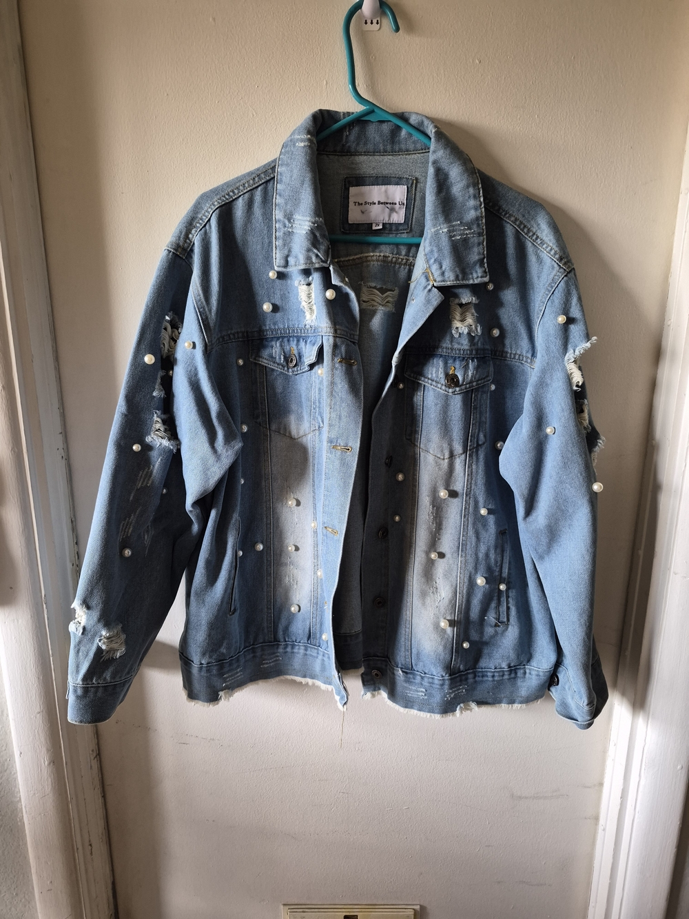 Women’s Light Blue Distressed Pearl-Embellished Denim Jacket